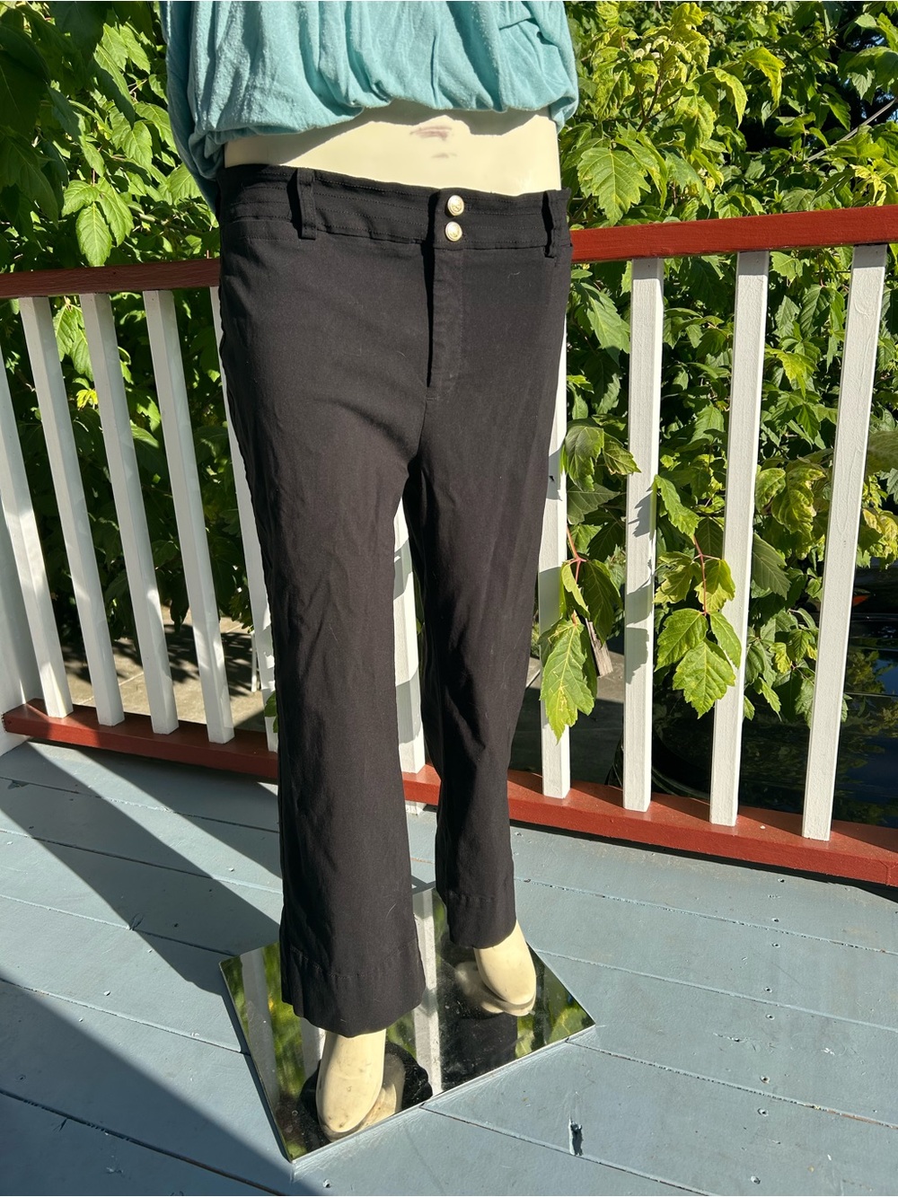 Pants with button closure
